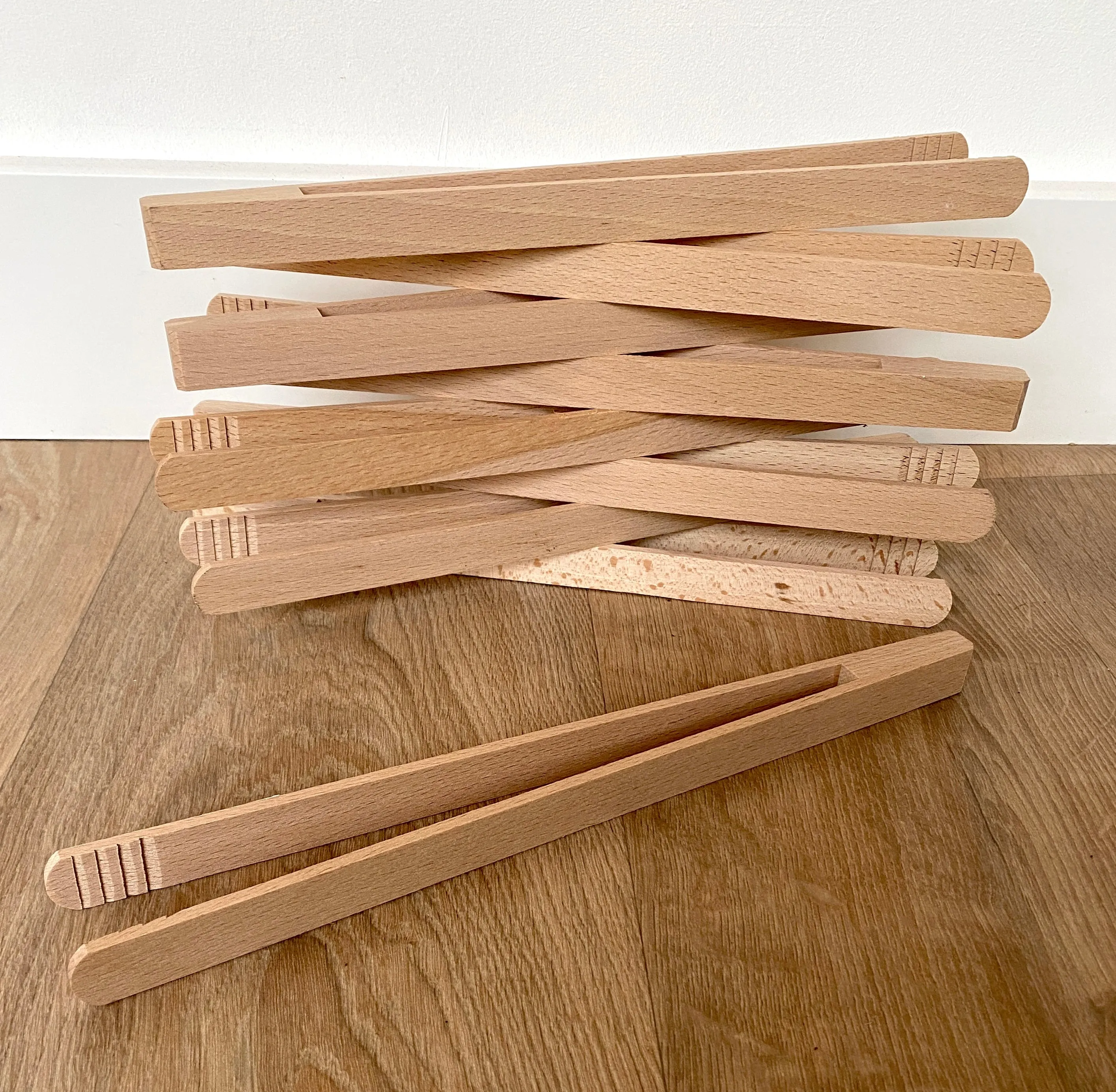 Large wooden tongs